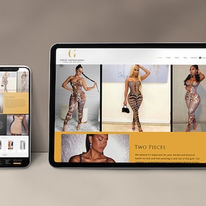 May include: A smartphone and tablet display a website showcasing two-piece outfits. The website features images of models wearing various patterned jumpsuits and corset tops. The website's color scheme includes gold and black.