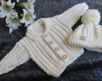 Hand knitted Aran baby cardigan, jacket coat with collar and hat . Generous size To fit Newborn - 6 M