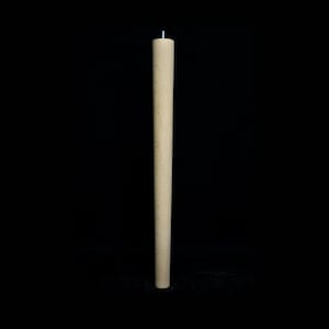 May include: A light brown wooden table leg with a metal screw at the top.