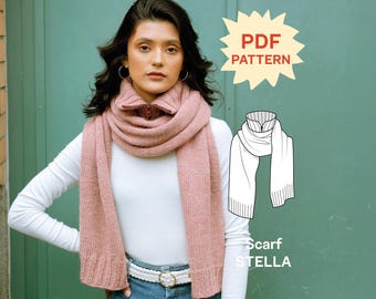 May include: A dusty rose knitted scarf with a ribbed collar and zipper detail. The image includes a star-shaped graphic with the text PDF PATTERN and a technical line drawing of the scarf labeled Scarf STELLA.