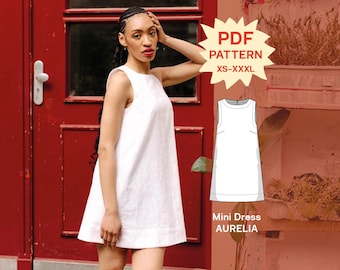 May include: A white sleeveless mini dress with a round neckline and a straight silhouette. The image includes a graphic overlay with the text PDF PATTERN XS-XXXL and a technical sketch labeled Mini Dress AURELIA.