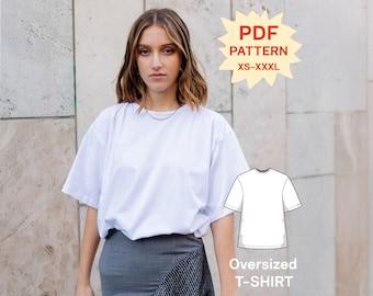 May include: A plain white oversized t-shirt with short sleeves and a crew neckline. The image includes a star-shaped graphic with the text PDF PATTERN XS-XXXL and a technical line drawing of the t-shirt labeled Oversized T-SHIRT.