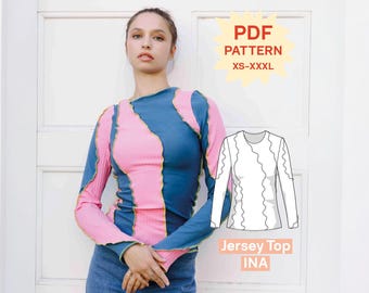 May include: A long-sleeve jersey top featuring alternating vertical panels of blue and pink ribbed fabric with exposed lettuce-edge seams. The image includes a white line drawing of the garment and text reading PDF PATTERN XS-XXXL Jersey Top INA.
