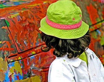 Color photo of Young artist Child Painting street photography drama poetic meaning narrative realism home decor digital prints fine art