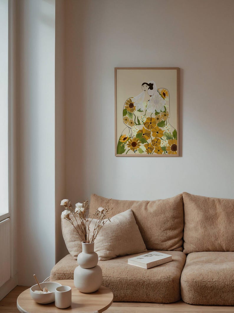 May include: A framed illustration of a woman wearing a dress made of sunflowers. The woman is sitting with her legs crossed and her hands in her lap. The background is a light beige color.