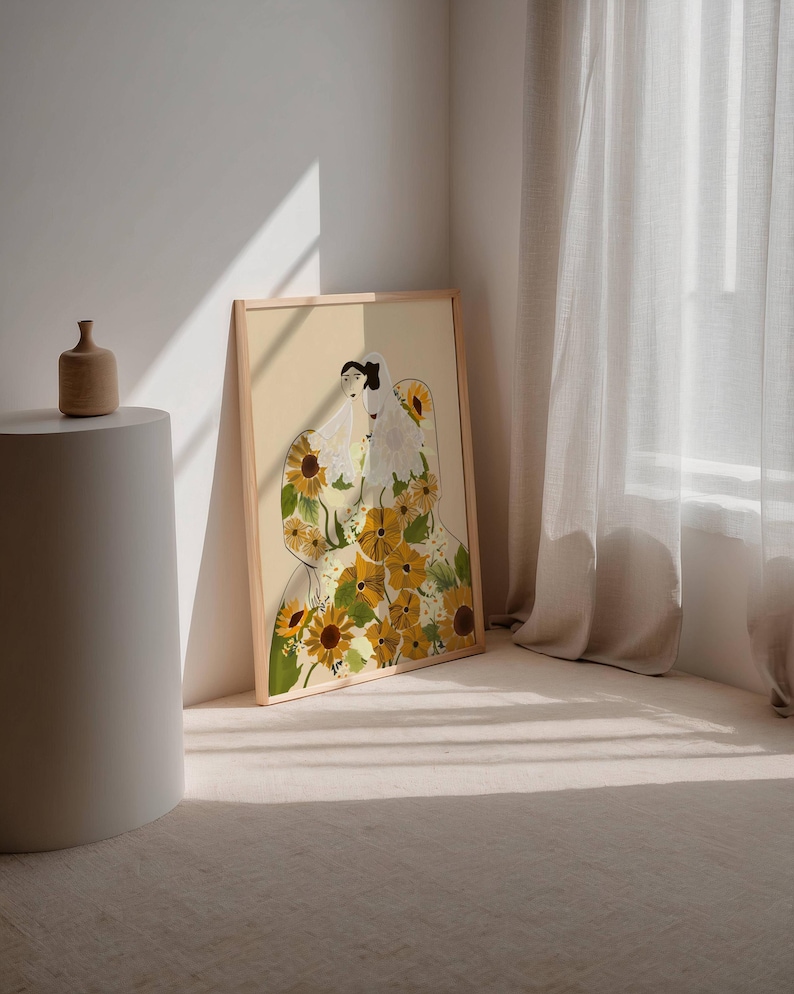 May include: A framed illustration of a person with a floral pattern made of sunflowers and other flowers. The background is a light beige color.