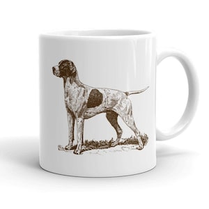 May include: White ceramic mug with a brown line drawing of a German Shorthaired Pointer dog standing on a grassy field.