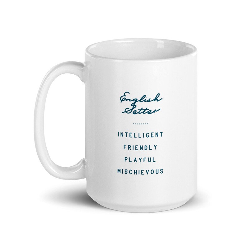 May include: White ceramic coffee mug with a blue inscription that reads "English Setter" and a list of traits: "Intelligent, Friendly, Playful, Mischievous".