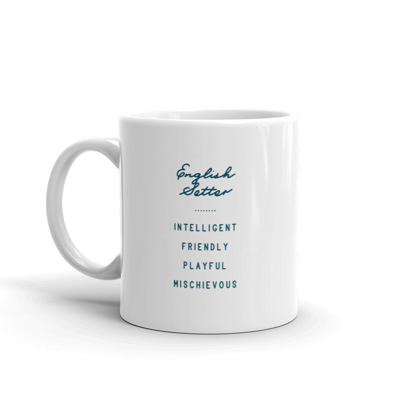 May include: White ceramic mug with a blue graphic that says "English Setter" and lists the dog breed's traits: intelligent, friendly, playful, mischievous.