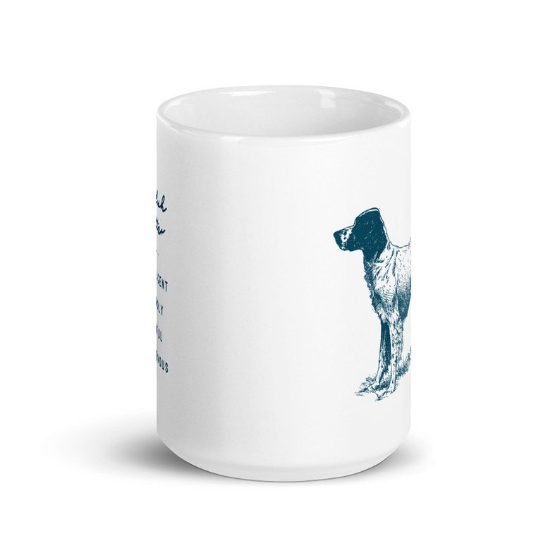 May include: White ceramic mug with a blue illustration of a dog. The text "Good boys are always good boys" is printed on the mug.