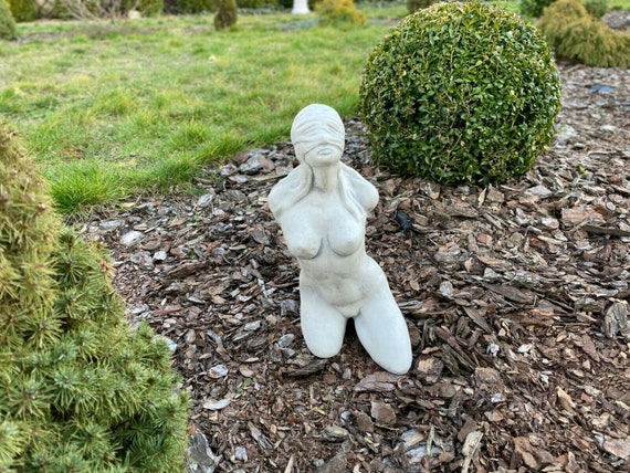 Naked Woman In The Garden