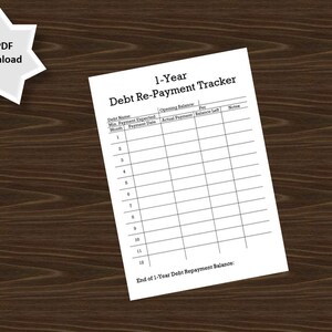 May include: A printable debt repayment tracker with a table to track debt name, minimum payment, expected payment date, opening balance, actual payment, balance left, and notes. The table has 12 rows for each month of the year. The tracker is designed to help you pay off debt in one year.