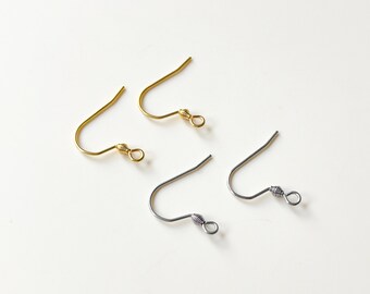 May include: Two pairs of earring hooks, one pair is gold and the other is silver.
