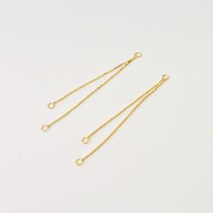 May include: A set of three ceramic mugs with a speckled, matte finish. The mugs are in shades of cream, light gray, and dark gray. Each mug has a simple, minimalist design, perfect for coffee or tea.