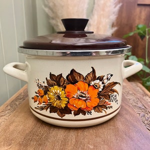 Vintage enamel casserole pot and lid, 1970s put brown lid with painted floral display ,fully functional as a cooking pot or as kitchen decor