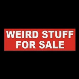 May include: Red rectangular sign with white text that reads "Weird Stuff For Sale".