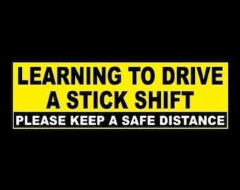 New "Learning to Drive a Stick Shift - Please Keep a Safe Distance" BUMPER STICKER warning decal, caution, funny, vinyl