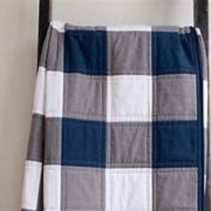Navy and Grey buffalo check quilt kit with pattern fabric for the top and binding. Available in 5 different sizes. PreCut Kit option.