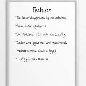 May include: A white dry-erase board with a silver frame hanging on a white wall. The board lists features of a product, including bar tack stitching, stainless steel lug adapters, soft flexible elastic, custom sewing, machine washable, quick air drying, and being crafted in the USA.