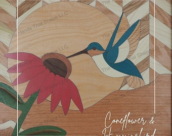 May include: A wooden art piece depicting a hummingbird with blue and green wings hovering near a red coneflower. The background is a wood grain pattern with a chevron design. The text "Coneflower & Hummingbird" is written in white on a black background.