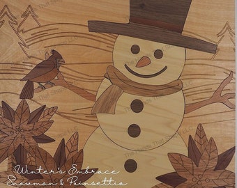 May include: A wooden art piece depicting a snowman with a cardinal perched on a branch. The snowman is wearing a brown hat and a scarf. The background is a woodgrain pattern with the text "Winter's Embrace Snowman & Poinsettia".