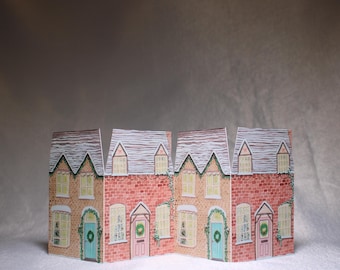 Cartão Sanfonado Casas de Inverno – Cartão Reciclado A7 Cortado à Mão, Decoração Festiva em Papel.