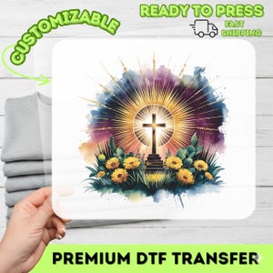 May include: A DTF transfer featuring a golden cross with a radiant sunburst design. The image includes yellow flowers, green foliage, and the text "CUSTOMIZABLE" and "PREMIUM DTF TRANSFER". The words "READY TO PRESS" and "FAST SHIPPING" are also visible.