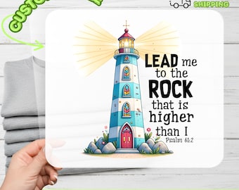 May include: A colorful lighthouse design with the text "LEAD me to the ROCK that is higher than I Psalm 61:2". The design includes a lighthouse with blue and white stripes, a red door, and a cross on top. The words "CUSTOMIZABLE" and "PREMIUM DTF TRANSFER" are also visible.