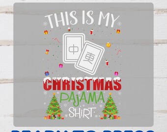 May include: A gray DTF transfer design with the text "THIS IS MY CHRISTMAS PAJAMA SHIRT" and two Mahjong tiles. The design includes Christmas trees, gift boxes, and snowflakes. The words "READY TO PRESS" are at the bottom.