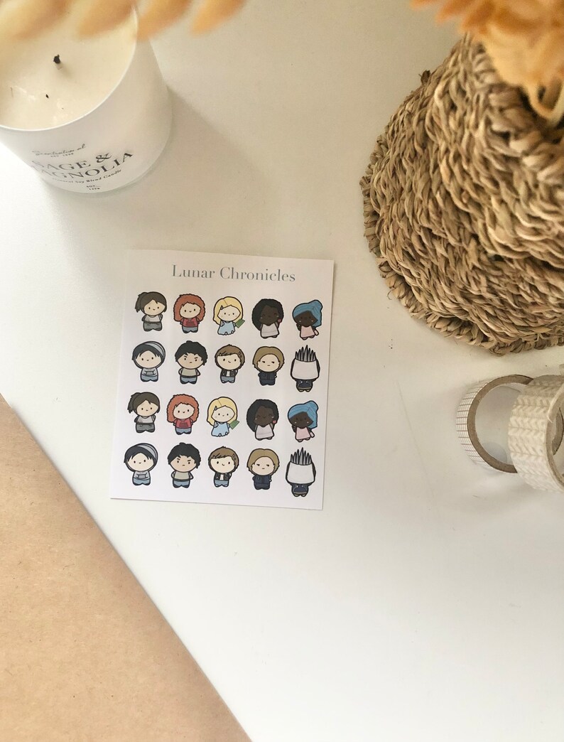 May include: A sheet of stickers featuring 20 different characters from the Lunar Chronicles book series. The stickers are colorful and feature a variety of characters with different hairstyles and clothing.