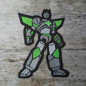 Transformateur vert fluo, robot, patch, application