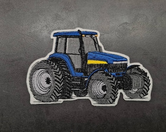 Tractor azul, parche, aplicación