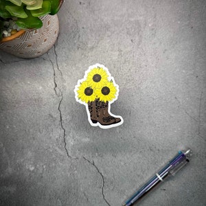 Sunflowers in Cowboy Boots Sticker - Western Charm for Your Gear