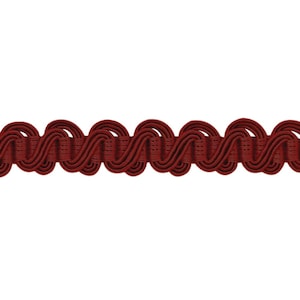 May include: Red braided trim with a wavy pattern. This trim is ideal for adding a decorative touch to curtains, cushions, and other home decor projects.