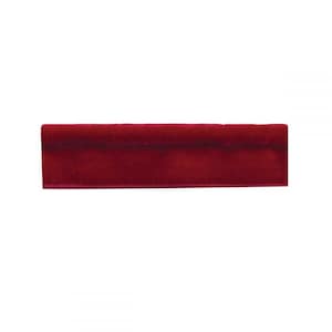 May include: A close-up of a red velvet trim. The trim is approximately 1.25 cm wide and has a smooth, soft texture.