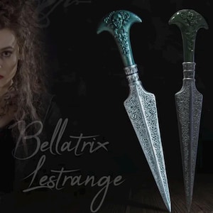 May include: Two decorative daggers with ornate silver blades and green handles. The handles feature a skull design. The text "Bellatrix Lestrange" is written in cursive script on the lower left side of the image.