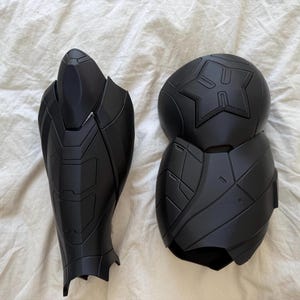 May include: A set of three ceramic mugs with a speckled, matte finish. Each mug features a different color: light blue, cream, and gray. The mugs have a simple, modern design, perfect for coffee or tea.