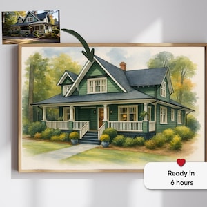 May include: A watercolor painting of a green house with white trim and a porch. The house is surrounded by trees and bushes. The painting is framed in a wooden frame.