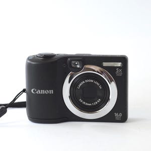Vintage digital compact point and shoot camera Canon PowerShot A1400 16Mega pixels