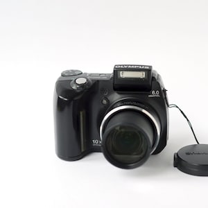 Olympus SP-500UZ digital compact camera with 6.0 Mega pixels
