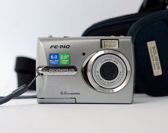 Vintage digital compact camera Olympus FE-140 with 6.0 Mega pixels