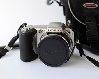 Vintage digital compact camera Olympus SP-600UZ Zoom with 12 Mega pixels