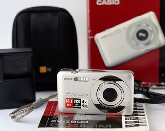 Rare Red CASIO EXILIM EX-ZS12 16.1MP Digital Compact Camera Rare Red CASIO EXILIM EX-ZS12 16.1MP Digital Compact Camera