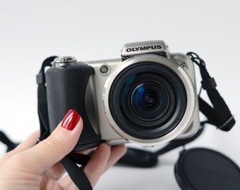 Vintage digital compact camera Olympus SP-600UZ Zoom with 12 Mega pixels