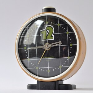 Vintage alarm brown & silver clock Yantar, Mechanical wind up clock from 80s. Mid century style large tabletop cute clock