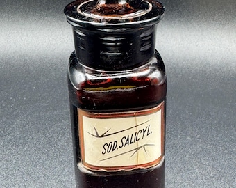 Frasco de boticario antiguo de ámbar del siglo XIX con tapón de salicilato de sodio.