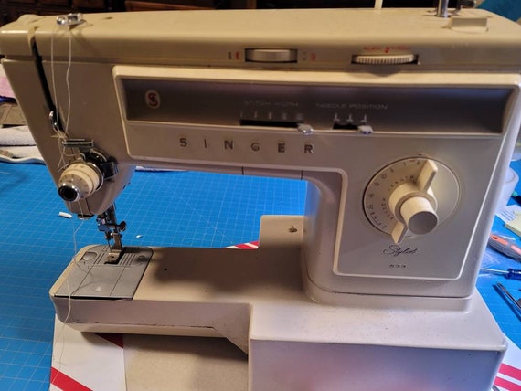 How to thread the Singer 533 sewing machine