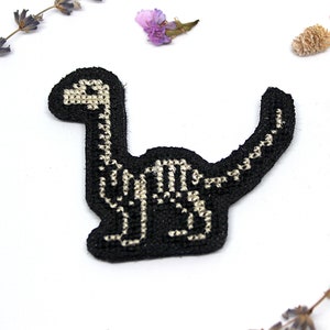 Parche de esqueleto de Dino