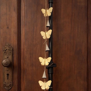 Handcrafted Cowbell Wind Chime with Butterfly Charms - Antique Gold Finish