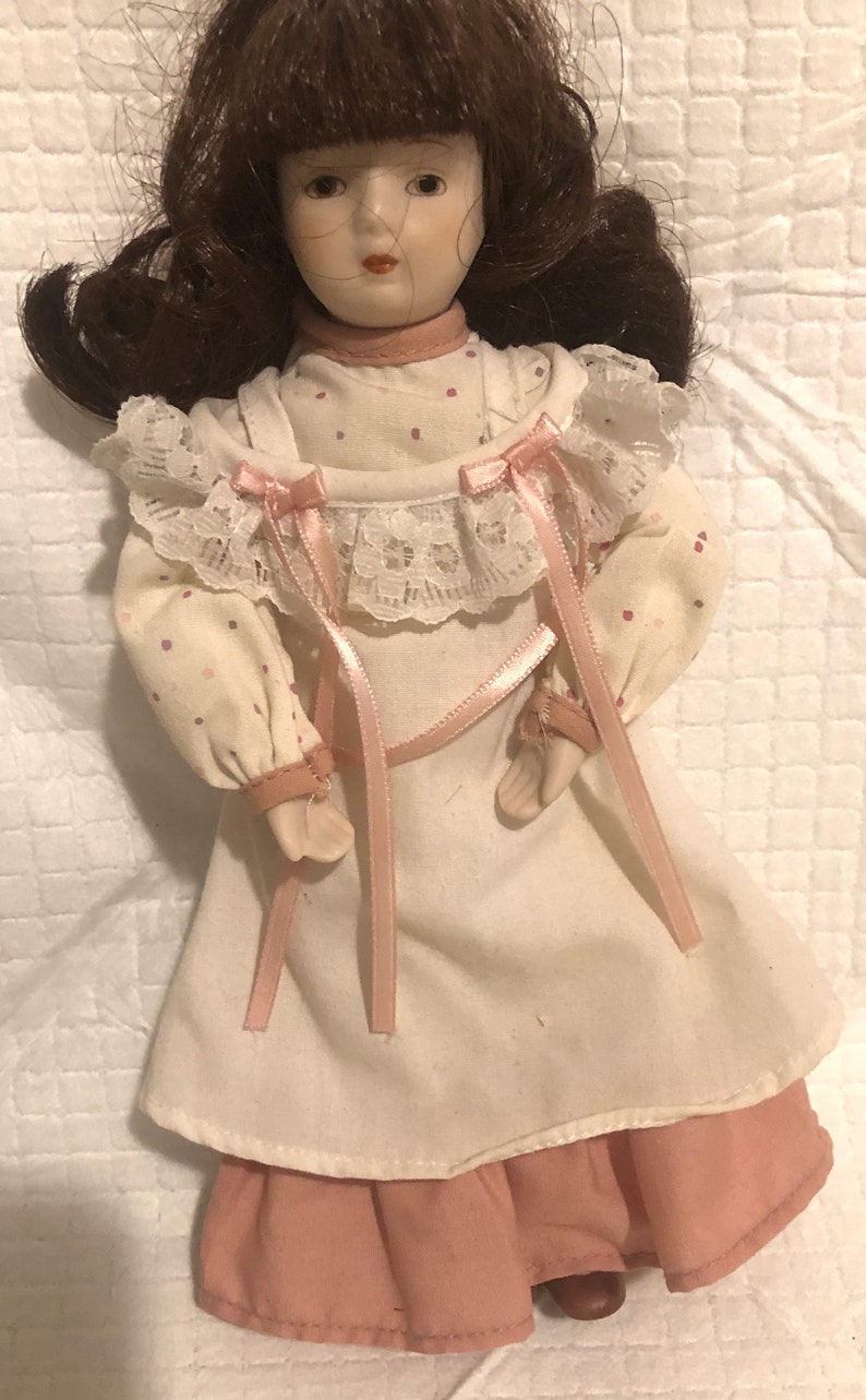 Porcelain Doll 8 1/2 Brown Hair Brown Eyes image 1